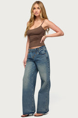 Moxlan Slanted Button Low Rise Baggy Jeans
