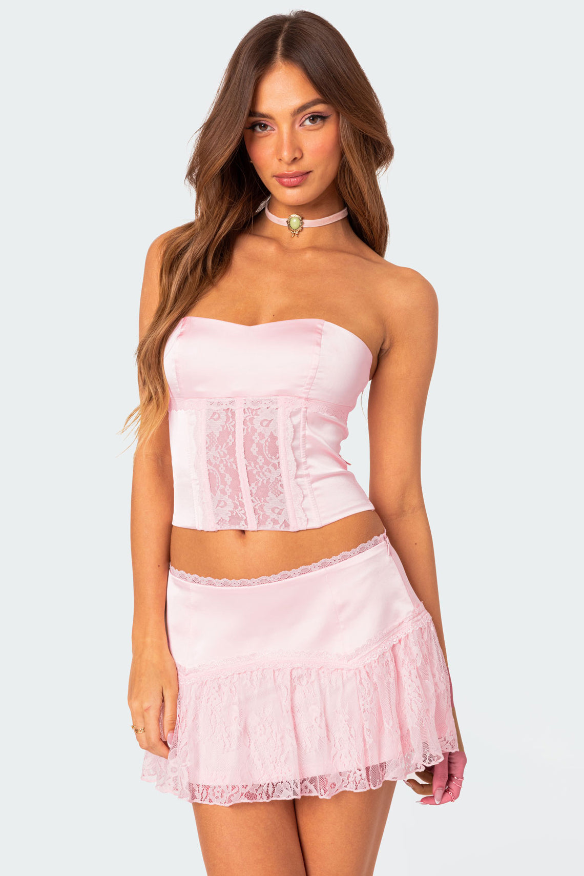 Light pink matching corset top and mini skirt, perfect for a Sabrina Carpenter inspired summer look.