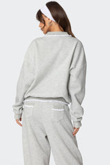 Ashtin Ruffle Trim Sweatshirt